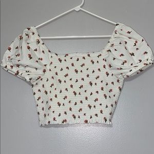 White flowery American eagle top